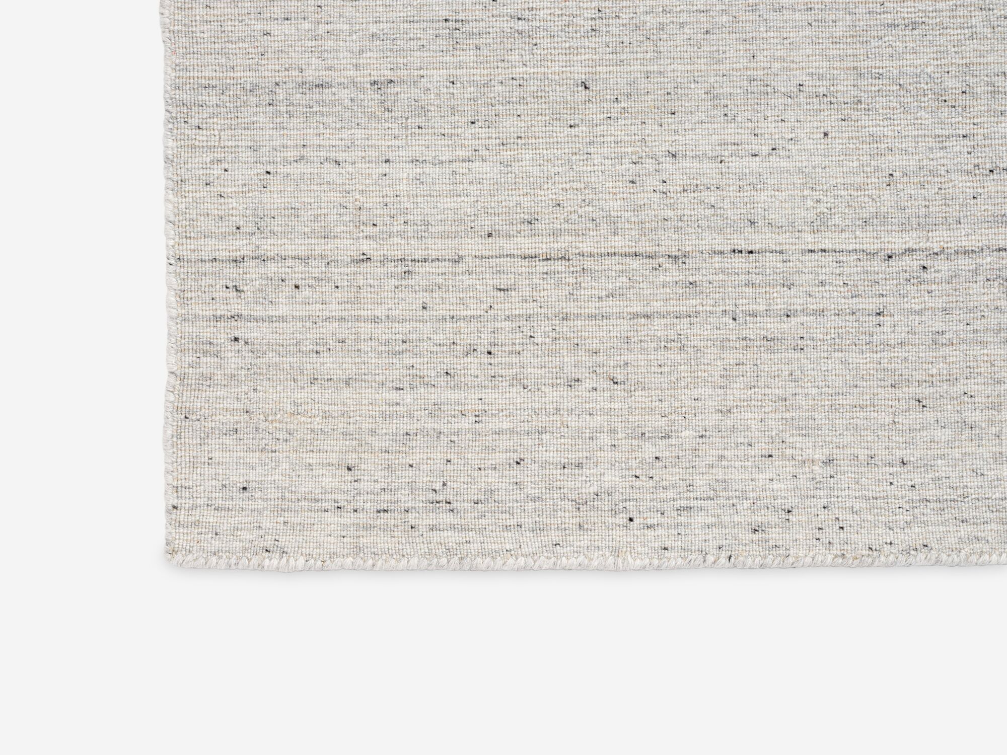 Large light grey woven area rug detail view